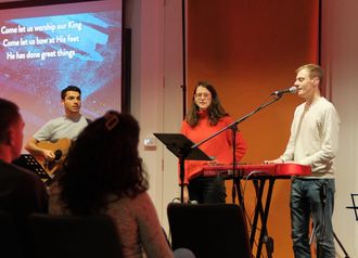 A team of musicians leading the church in sung worship